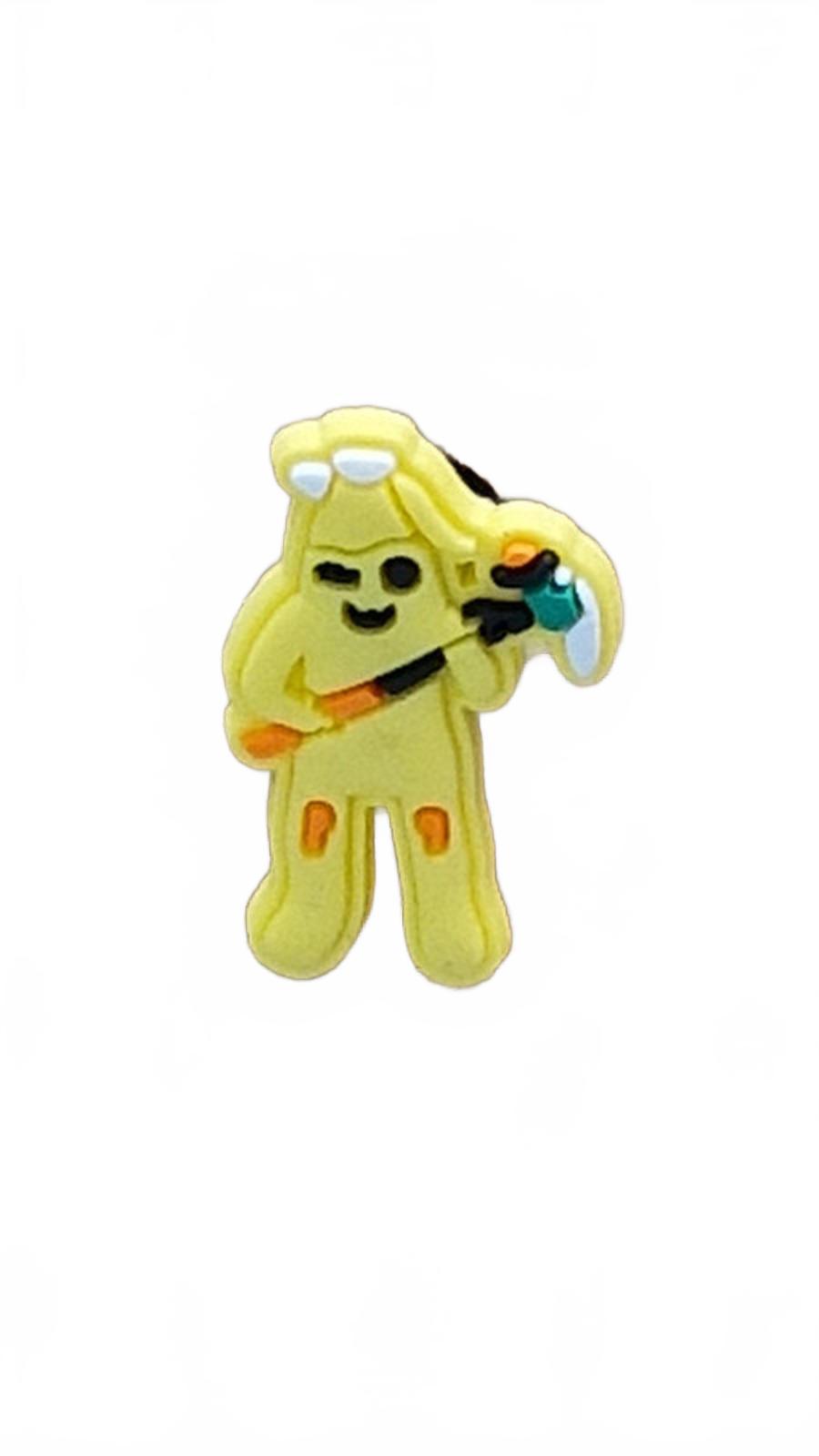 Cartoon style scary banana man holding pick axe with both hands Halloween shoe charm