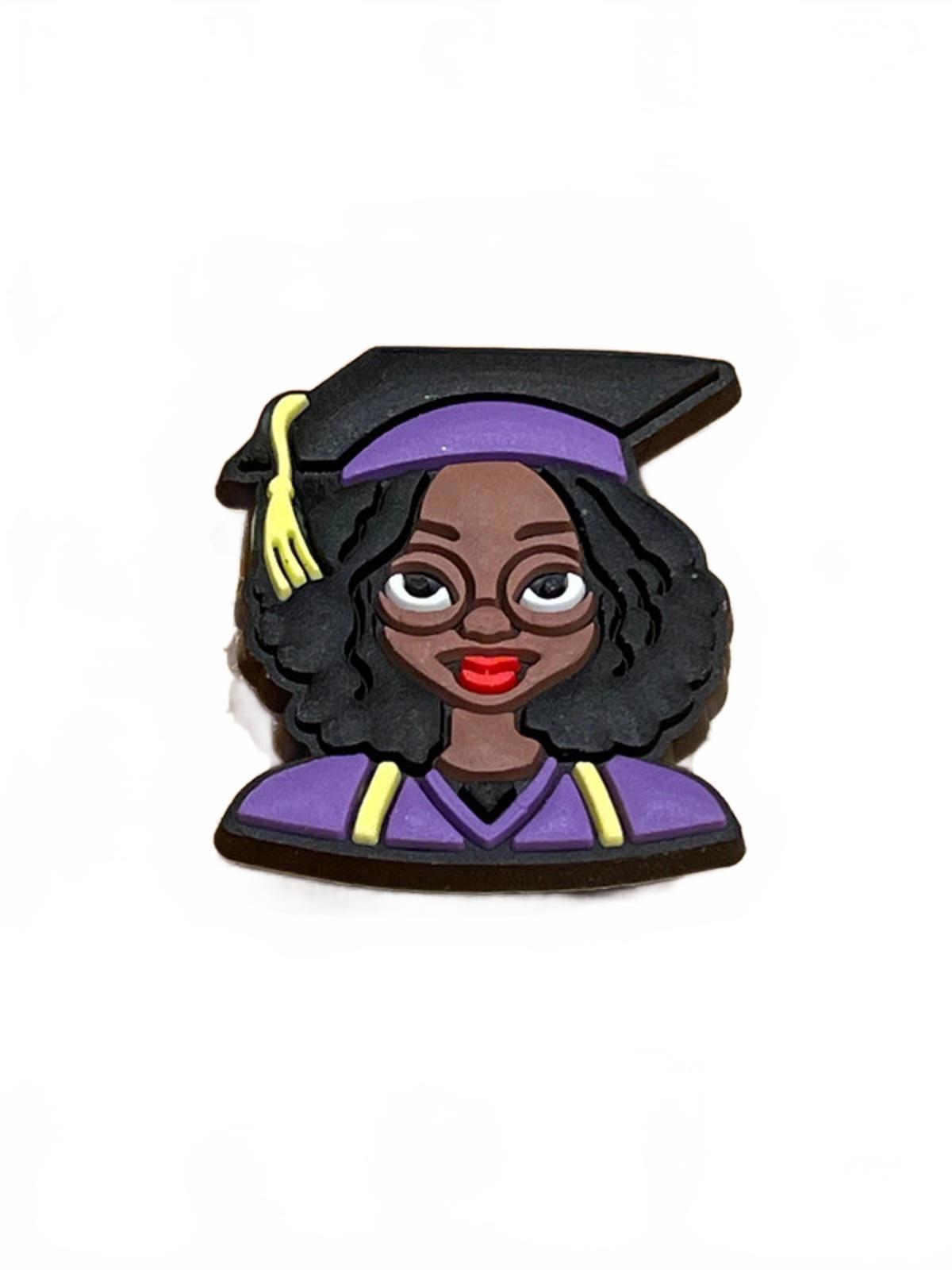 Black girl with glasses and lipstick wearing graduation hat and robe shoe charm