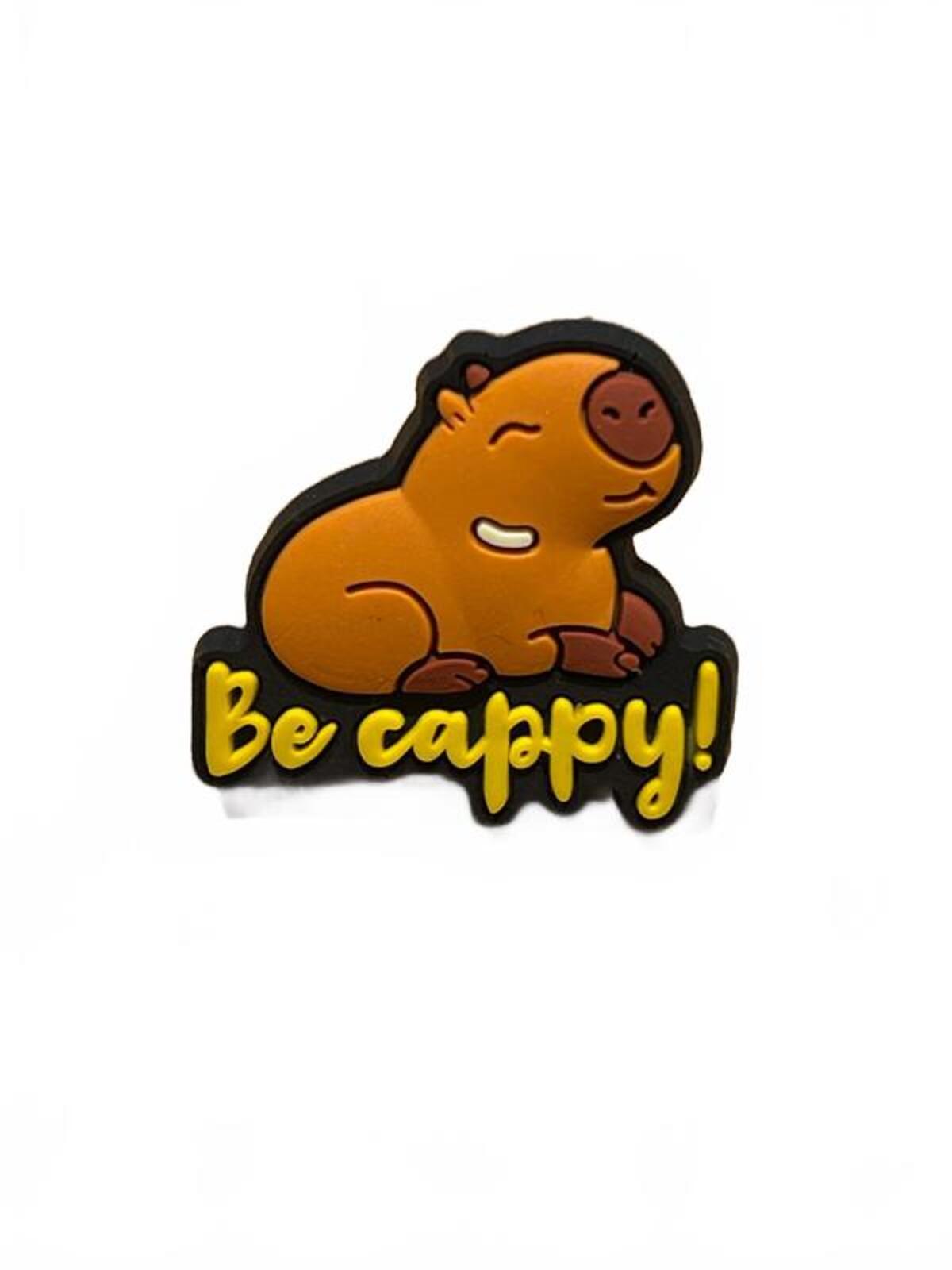 Cute capybara sitting on top of signpost 'Be Cappy' shoe charm