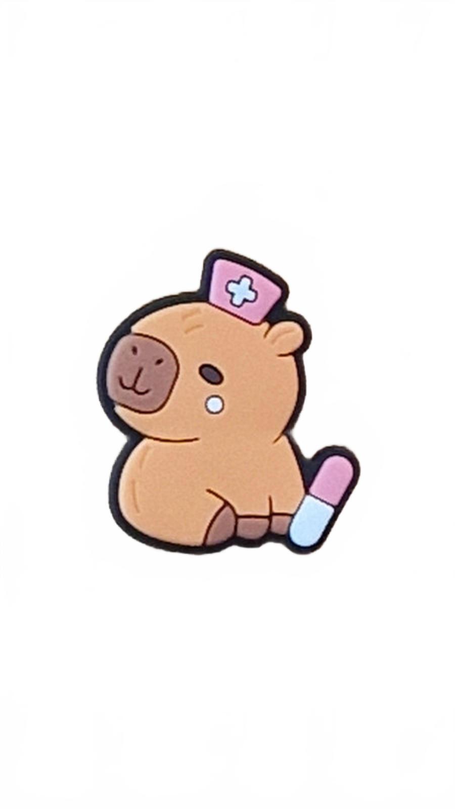 Cute capybara with pink nurses hat and pink table medicine shoe charm