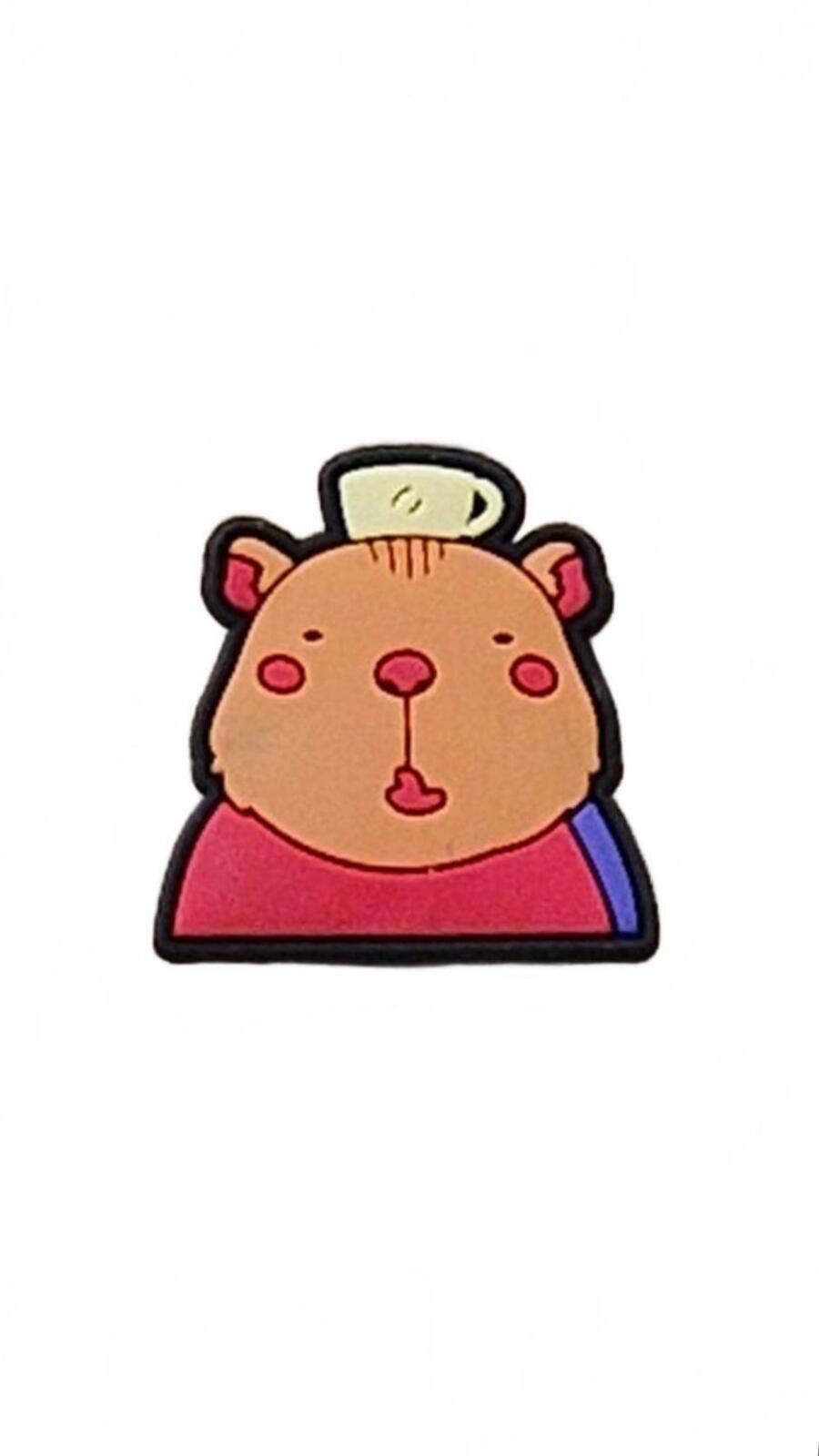 Cute capybara head wearing yellow tea cup on head shoe charm