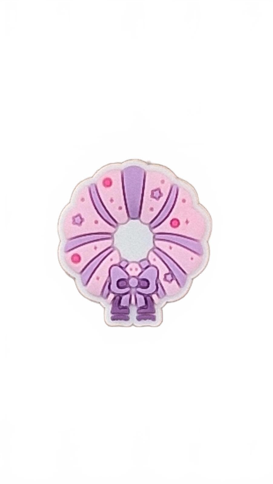 Pink and purple wreath with a bow on a white background