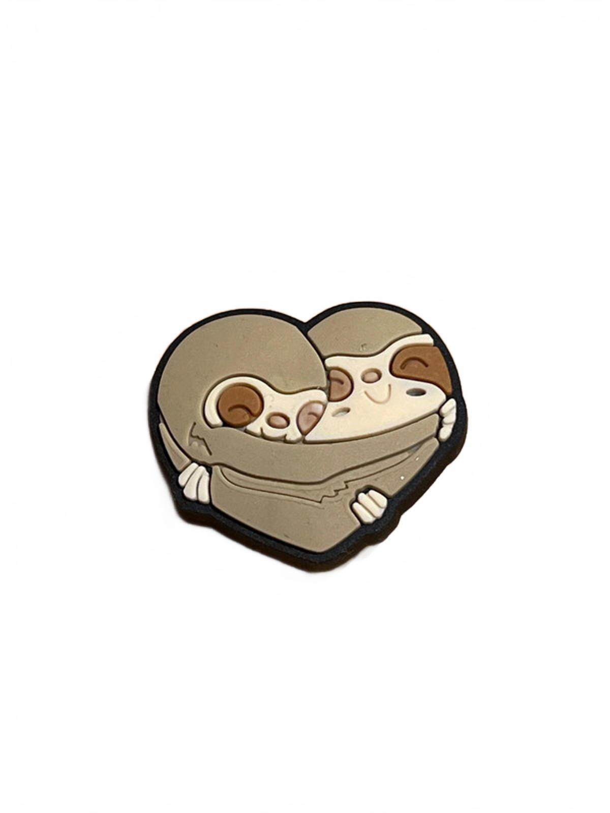 2 cute sloths hugging each other in a heart shape shoe charm