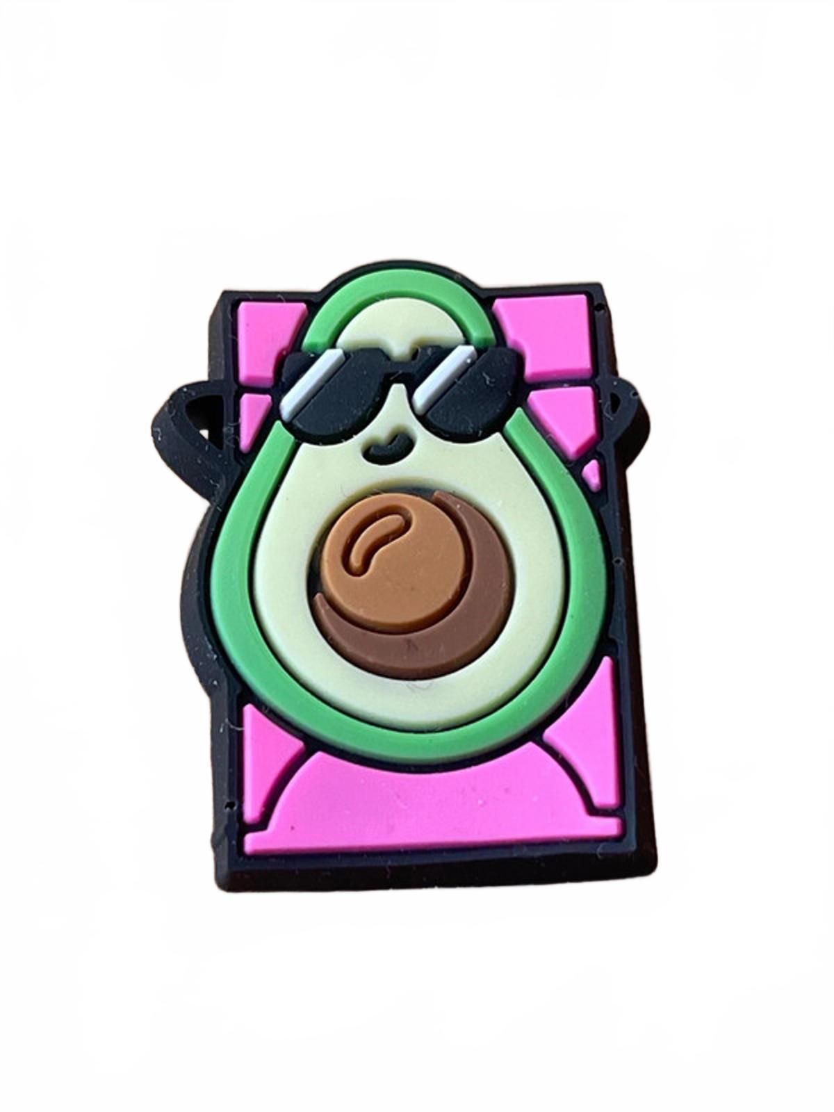 Cute cartoon avocado sun bathing on pink mattress shoe charm