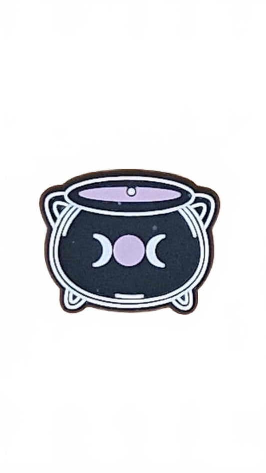 Black cauldron with moon Halloween shoe charm.