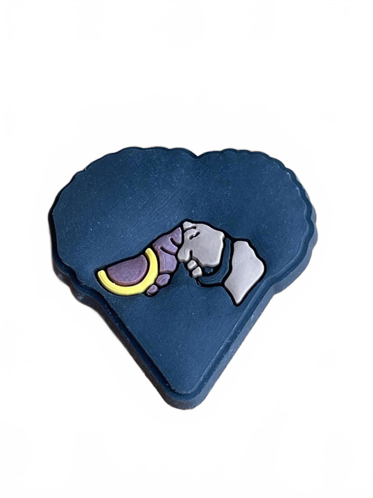 Cute black man and woman in love together heart shoe charm