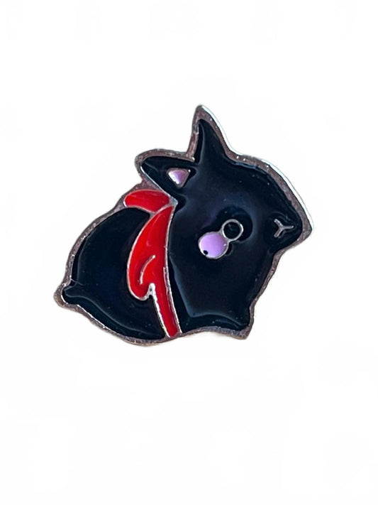 Cute black rabbit with pink cheeks wearing red bow tie enamel pin