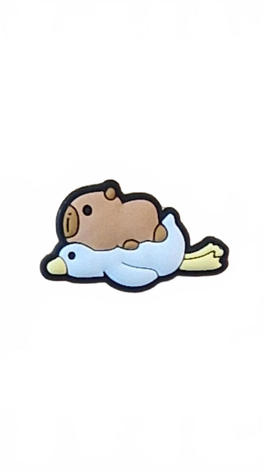 Cute capybara flying on duck's back shoe charm