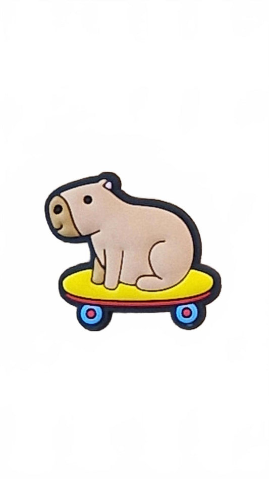 Cute capybara riding yellow skate board shoe charm
