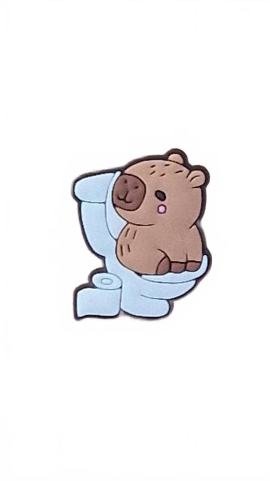 Cute capybara sitting on toilet with roll shoe charm