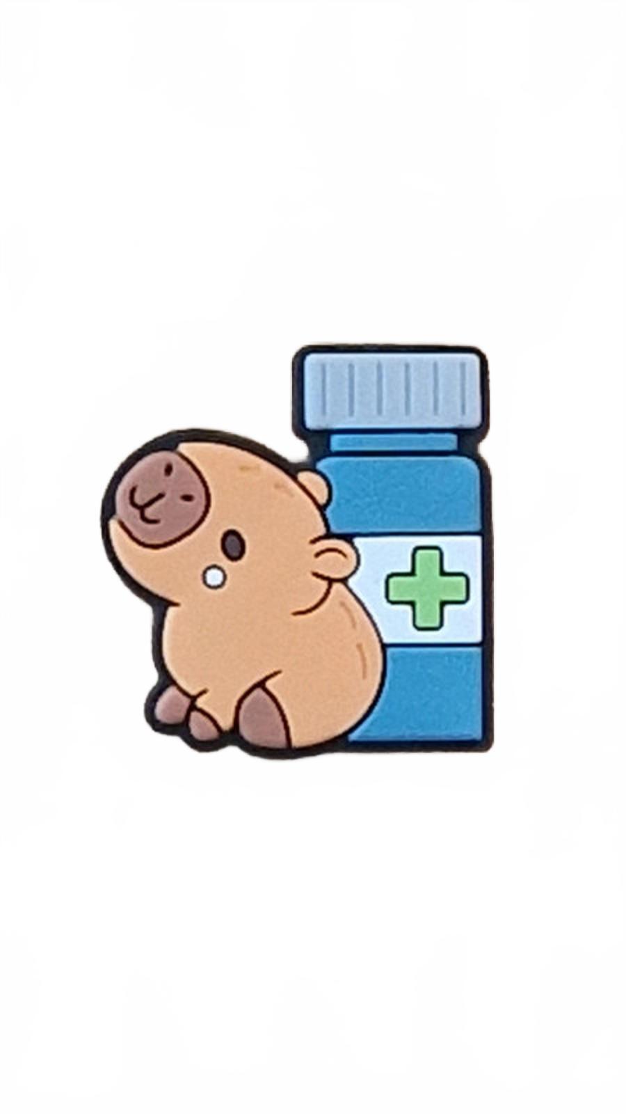 Capybara sitting next to a blue pill bottle with a green cross on a white background
