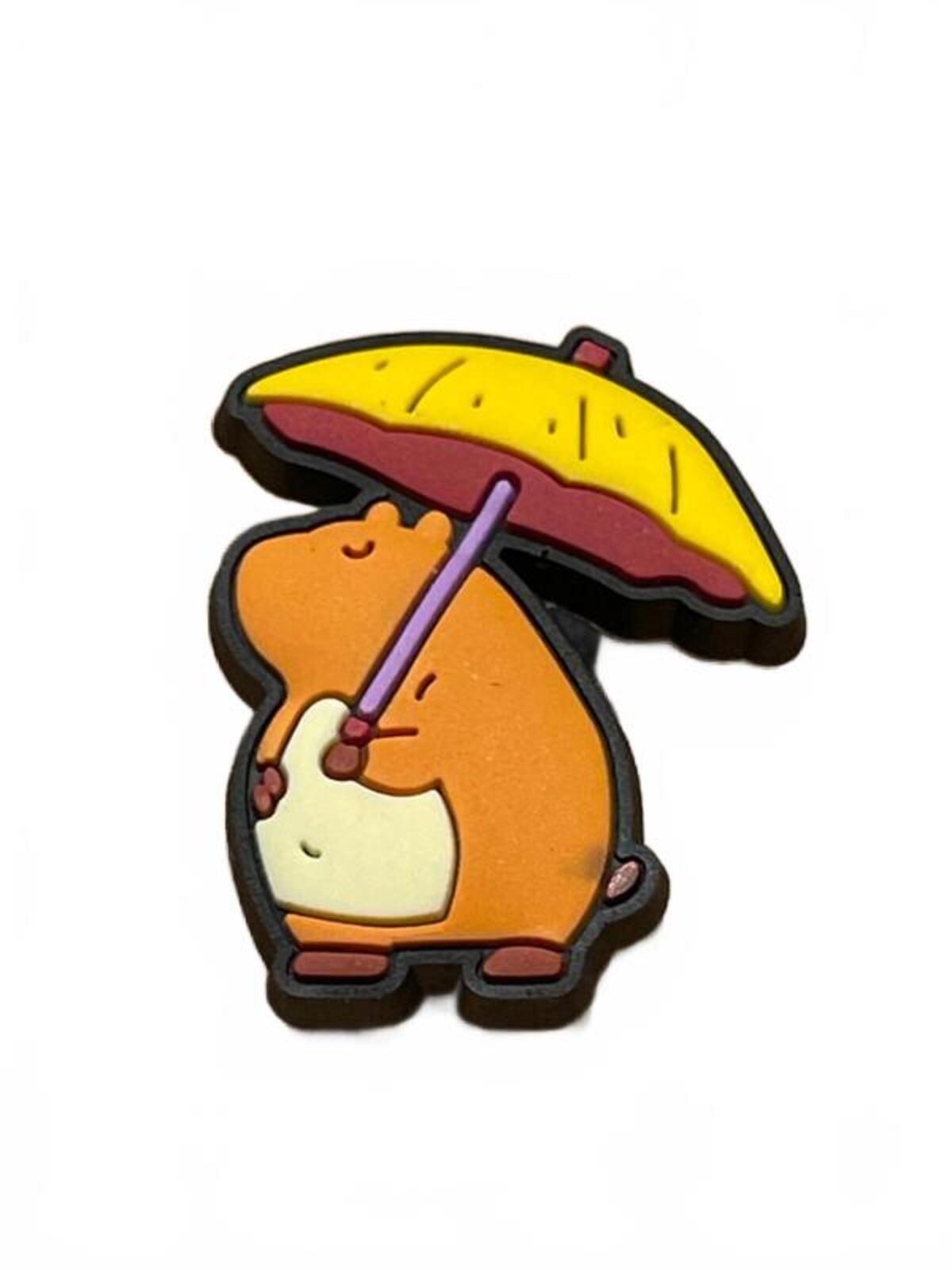 Cute capybara shielding under large yellow umbrella shoe charm