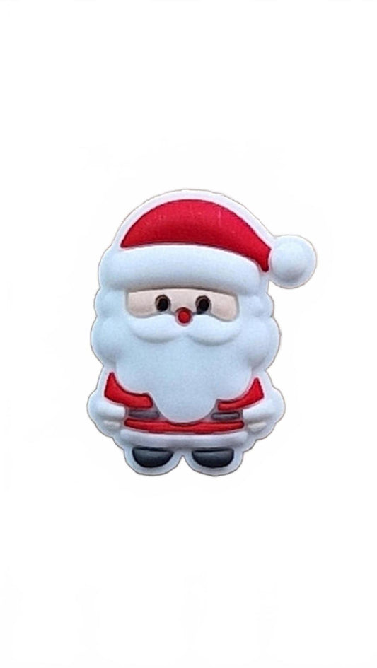 Cartoon Santa Claus shoe charm on a white background