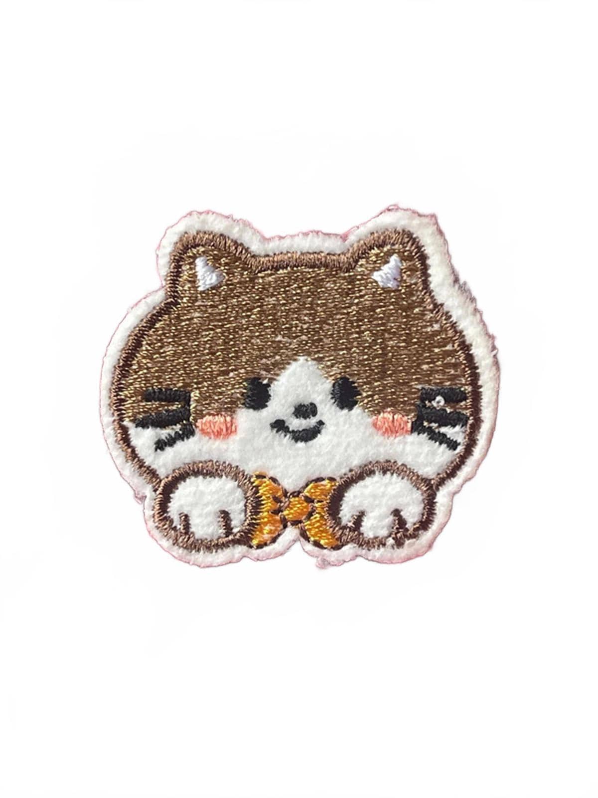 Embroidered patch of a cartoon cat with a bow tie on a white background