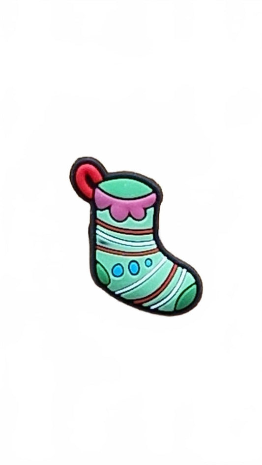 Colourful Christmas stocking shoe charm on a white background