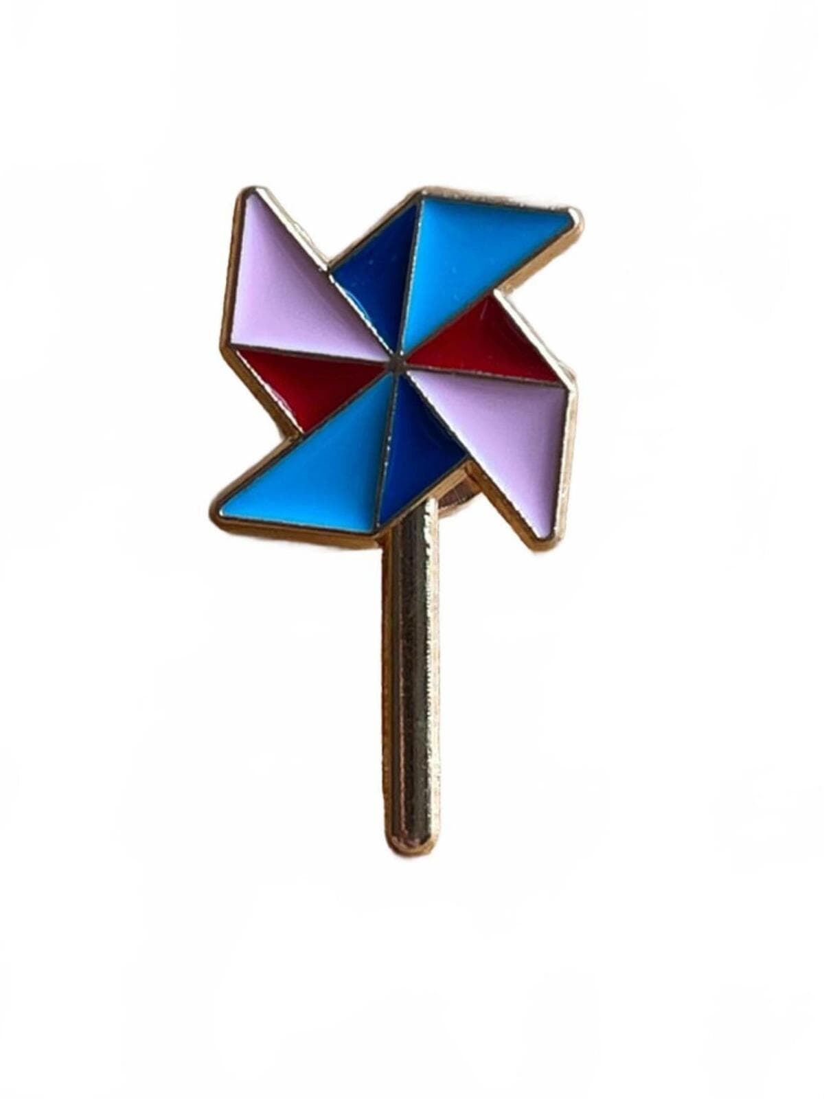 Colorful pinwheel-shaped lapel pin on a white background
