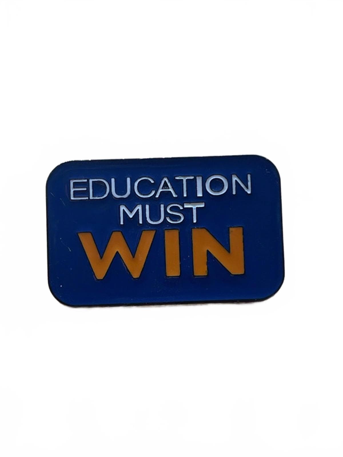 Blue enamel pin with 'EDUCATION MUST WIN' text on a white background