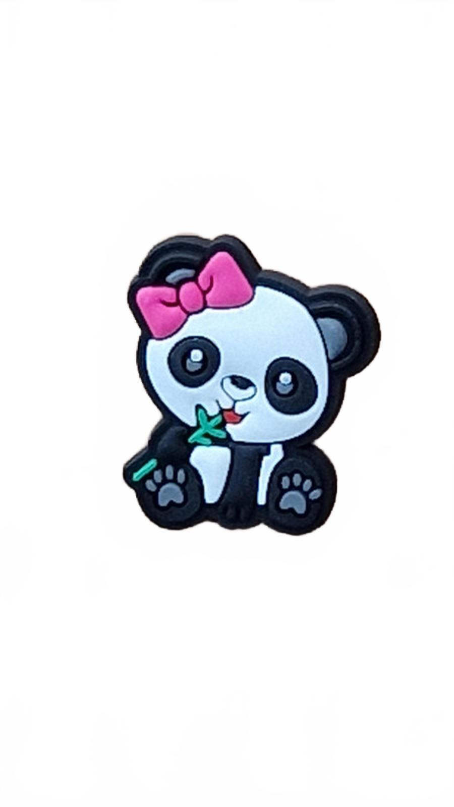 Cute panda sitting with pink bow tie eating bamboo shoe charm