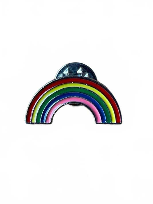 Cute rainbow-shaped enamel pin on a white background