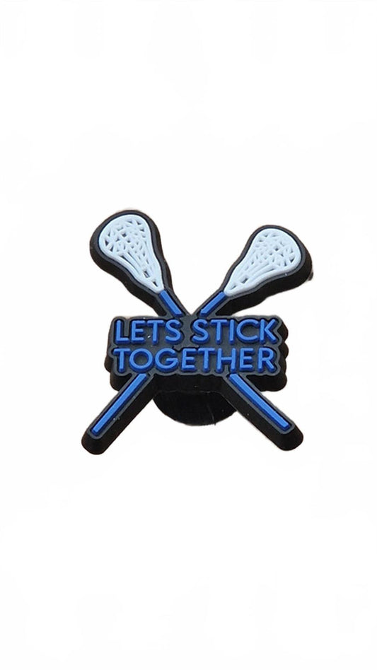 2 lacrosse sticks crossed let's stick together blue badge shoe charm