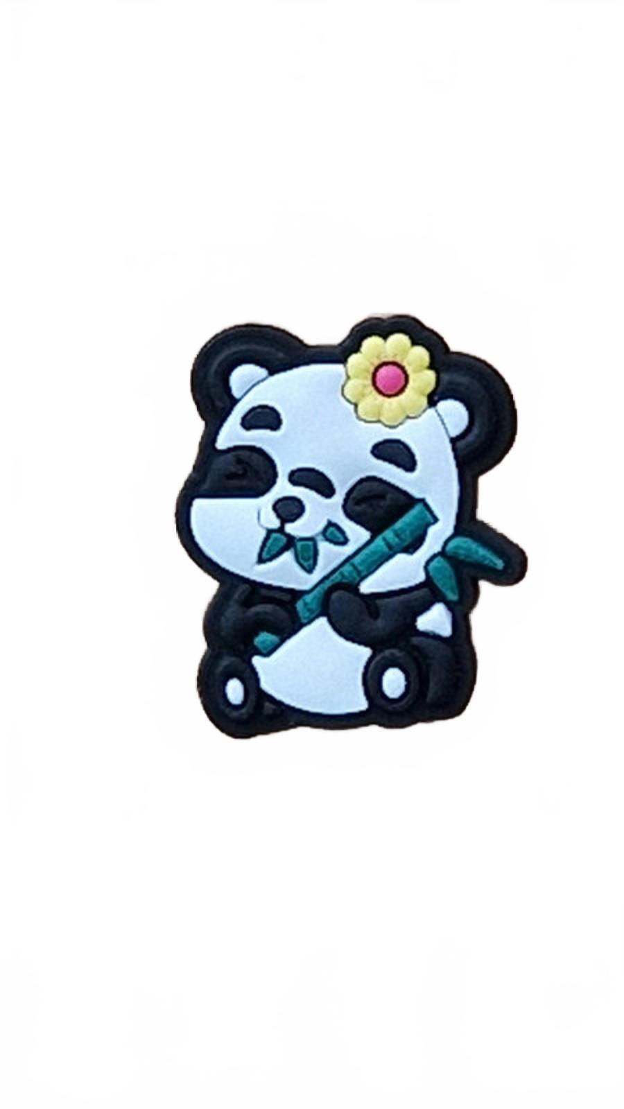 Cute panda smiling and eating bamboo wearing a yellow flower shoe charm