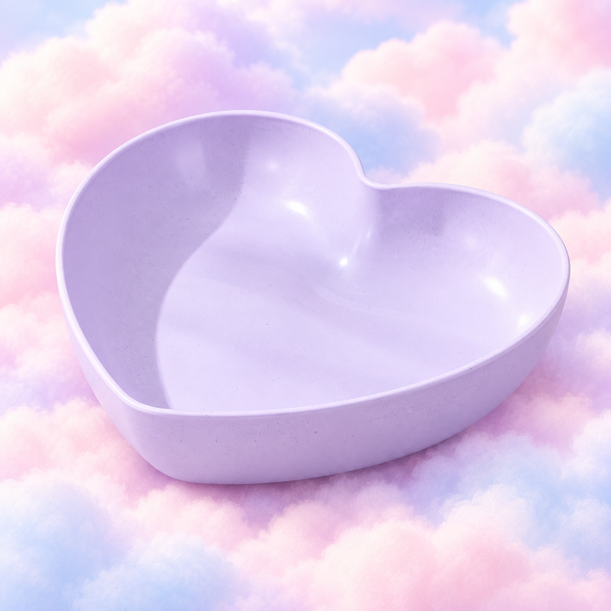Lilac heart-shaped plastic bowl with a speckled finish on pastel clouds.
