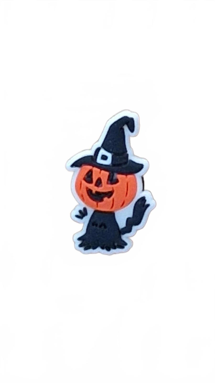 Witch with a large pumpkin head on a broomstick shoe charm