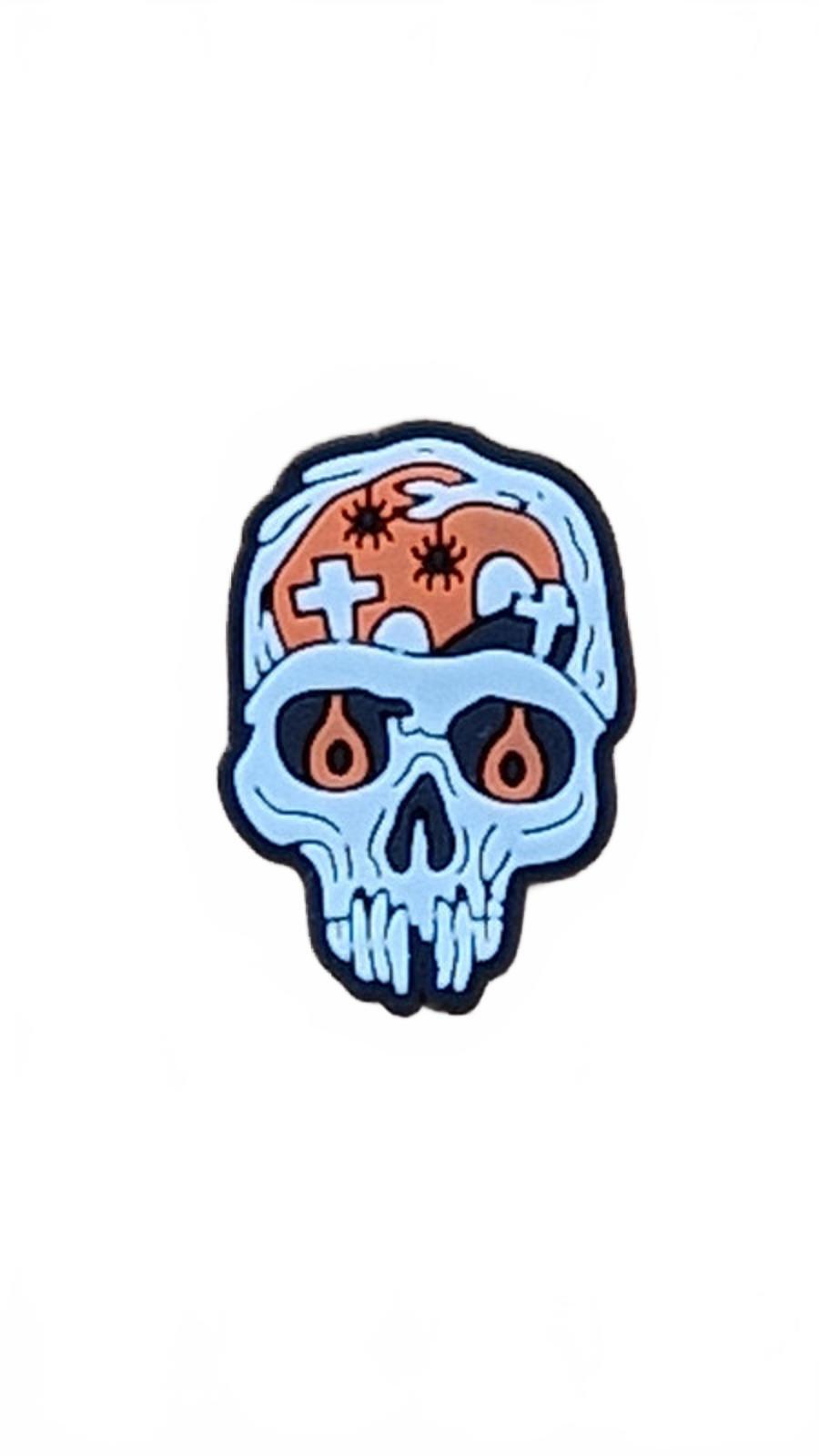 Skull with orange graveyard and spiders shoe charm