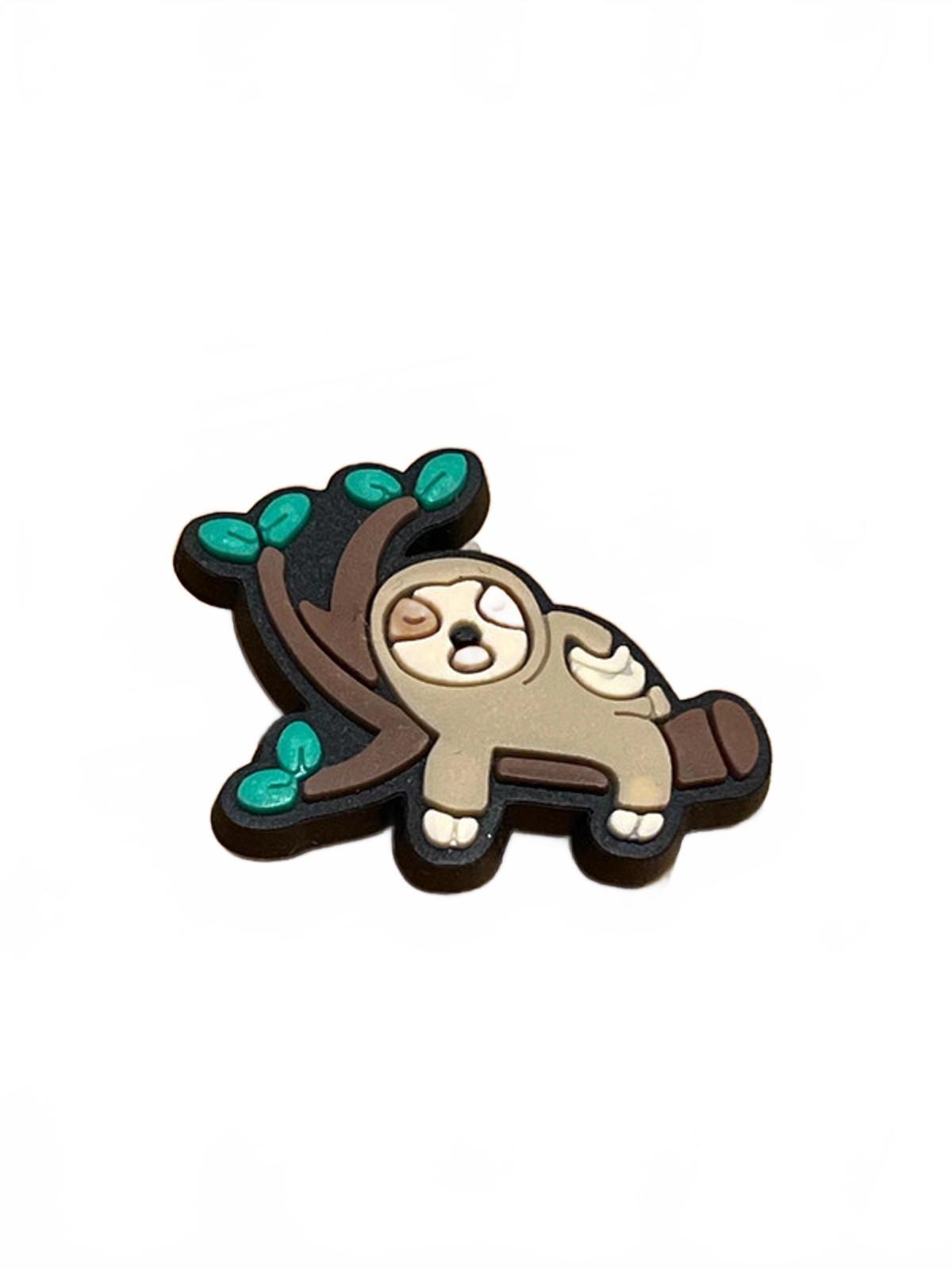 Cute sloth asleep on a tree branch with green leaves shoe charm
