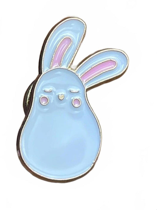 White bunny-shaped enamel pin with pink inner ears and pink cheeks on a white background