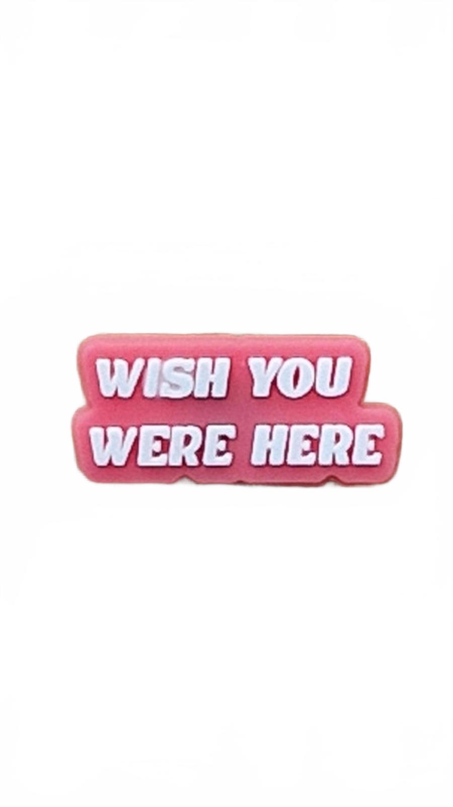 Pink and white wish you were here badge style shoe charm